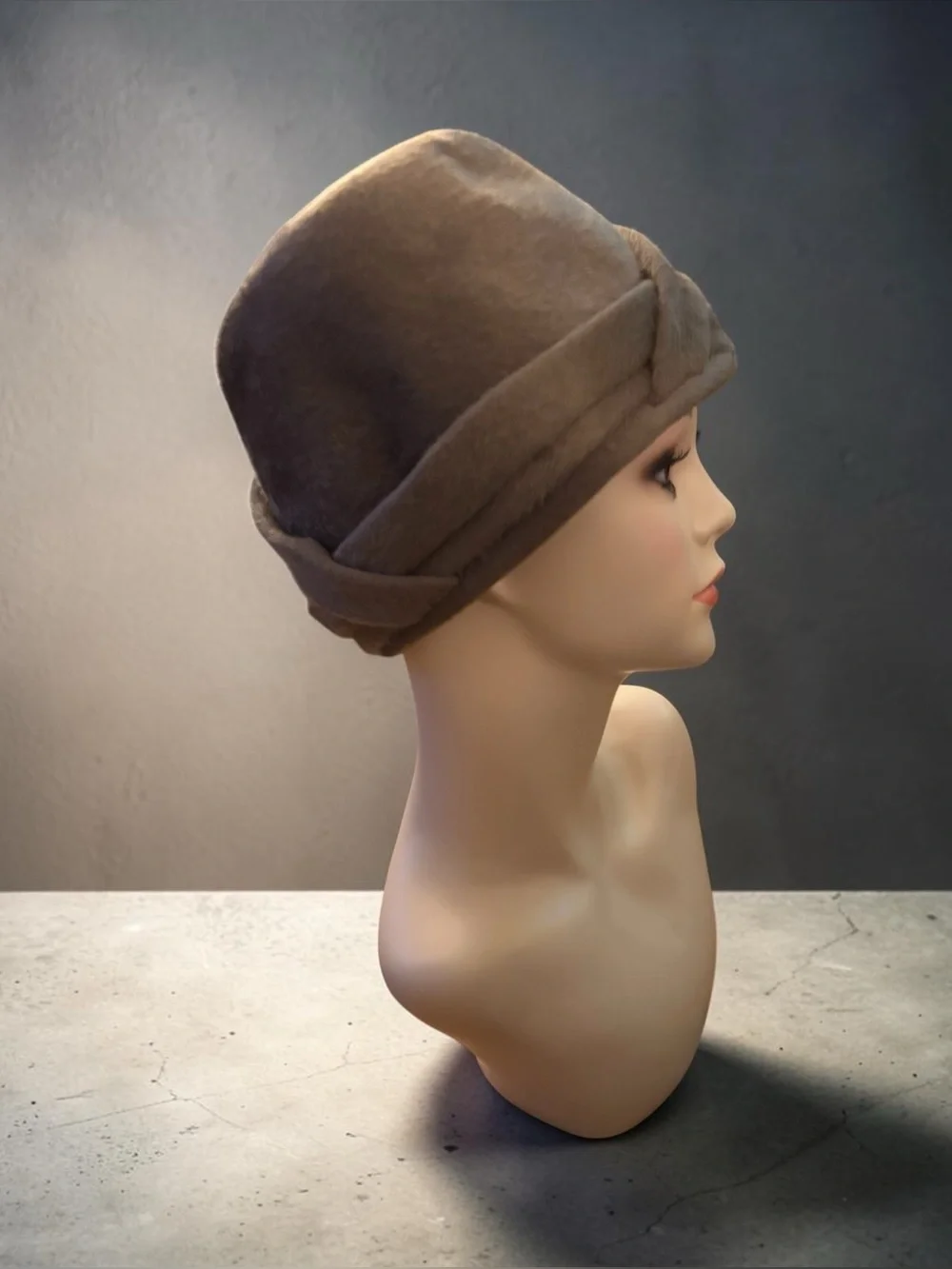 Vintage taupe wool-blend draped cloche hat features an elegant asymmetrical wrap